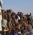 20 شهيدا وعشرات الجرحى بانقلاب شاحنة على طالبي مساعدات بغزة!